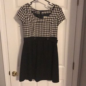 Cap-sleeved wool dress.